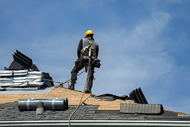 Professional Roofing technician working in Melville, NY